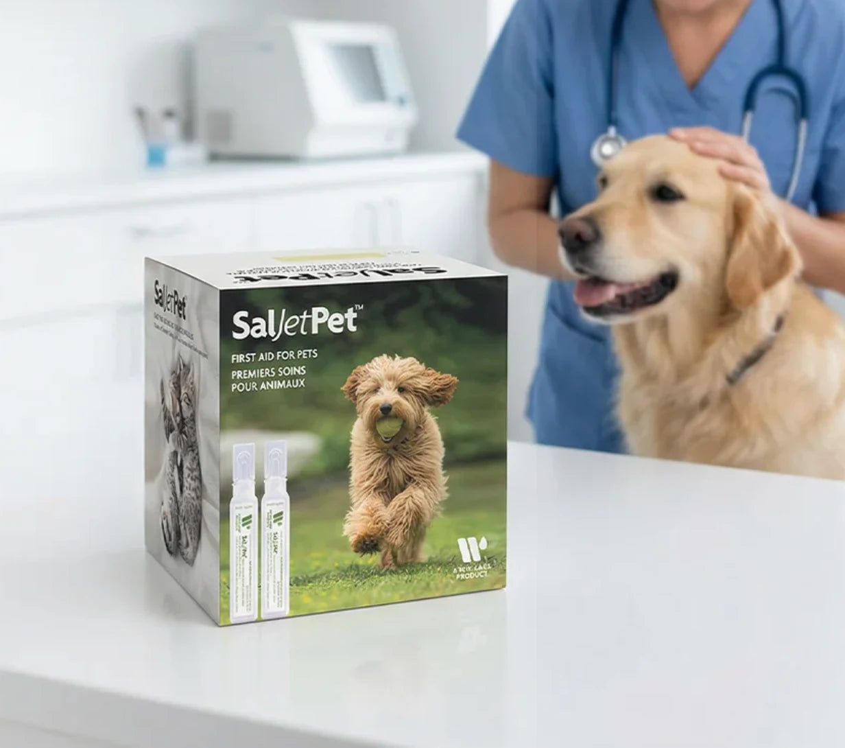 SalJetPet sterile saline flush product box with golden retriever in a veterinary clinic